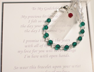 The bond between a Godmother and Godchild is something special. A Godmother is a person that a Godchild looks up to for guidance, love and support. This special bracelet is a beautiful gift idea to give to your Godchild on baptism/christening day or for a First Holy Communion Gift. The bracelet is created with swarovski crystals and a sterling silver clasp and chain. The Godchild birthmonth color and clear crystals create the bracelet and the birthmonth color of the Godparent hang next to the clasp. 4" or 5" is an infant size recommended for baptisms or christenings. 6" is recommended for First Communion gifts. Each bracelet includes an adjustable clasp that extends the bracelet another 1 - 1/2" (for example - the 4" bracelet is 4" of beads and 1 - 1/2" of extender chain).