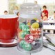 Personalized Teacher Treat Jar - Engraved Teacher Goodies Treat Jar Give your favorite teacher a lovely, personalized teacher gift which will look great in the classroom or at home. Our Personalized Teacher Treat Jar is perfect for storing classroom rewards including stickers, candy or little play toys. Your Engraved Teacher Treat Jar measures 7" h x 4" w and holds 31 oz. Each glass jar comes with an air-tight glass lid. Contents displayed in glass jar not included. Includes FREE Engraving. Personalize your Worlds Greatest Teacher Treat Glass Jar with any name. ( ie. Mrs. Young )
