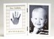 Godfather gift. 5x7 double white tabletop frame with space for godchilds handprint and sentiment and 5x7 photograph. Comes complete with acid free, child-safe silver stamp and instructions 