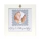 6x6 white frame with sentiments to commemorate a child’s religious event. Scalloped silver paper and metal cross. 