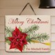 Bring Christmas cheer to your home this holiday with our beautiful Personalized Poinsettia Welcome Slate Plaque. This festive designed Christmas Wall Hanging is sure to bring Christmas spirit along with best wishes from those who visit your home. All Personalized Holiday Slate Plaques make excellent Christmas Gift ideas for family and friends. Your Personalized Poinsettia Welcome Slate Plaque measures 11" x 9". Each natural slate plaque arrives with a leather strap for wall hanging. Includes FREE Personalization! Personalize your slate plaque with any one line custom message. ( i.e. The Mitchell Family) Slate plaques have a rough, natural slate look. Each plaque has its own natural variations in texture and edge.