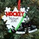 Honor your favorite Hockey Fan or Hockey Player with their very own Personalized Hockey Christmas Ornament. This Custom Hockey Ornament is perfect for any sports lover and becomes a treasured keepsake they will cherish for years and years to come.  This resin Personalized Hockey Ornament is individually hand painted and measures 4.5" x 3.5". Each Personalized Christmas Ornament includes a ribbon loop. Personalized your Hockey Ornament with any name and year.