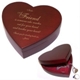 Our Personalized "A Friend" Heart Jewelry Box is made of wood with an elegant Rosewood finish, a hinged cover and measures 5.75" x 5.5" x 2". Inside bottom is lined with burgundy velvet. Gift Includes FREE Personalization! Personalize with any name,title (i.e. Sister) and any two line message. 