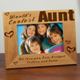Let your Aunt know just how special she is with our personalized Coolest Aunt Frame. Our Worlds Coolest Personalized Aunt Wood Picture Frame measures 8 3/4"x 6 3/4" and holds a 3.5"x5" or 4" x 6" photo. Personalized Aunt Photo Frame also includes an easel back for desk display. 