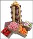 Send sweet goodness in a wonderful tower presentation to family, friends, co-workers or corporate gifts. Sweet polka dots and stripes on the outside, even sweeter on the inside. Dotted with old-fashioned candies that will make your mouth water and your heart skip a little nostalgic beat, weve loaded this tower to the brim. Memorable candies include chocolate covered cream "mintees", soft raspberries, nordic sea shells and Swedish forest berries.