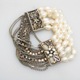 This a fun and trendy style fashion bracelet makes a great gift for yourself or to a special friend or family member. Dress up or down, stretch style slips on the wrist easily. Wear pearl side or chain side for two different looks. 