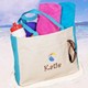 Have fun this summer heading to the beach, pool or lake with your own Embroidered Beach Ball Tote Bag. This cute tote bag brings the warmth of the sun along with your water toys, beach towels and suntan lotion. The perfect accessory for a Mom on the go or for the kids carrying all their sand castle tools.