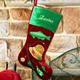 This Embroidered Fisherman Stocking is the best catch yet. This classic yet sophisticated Christmas Stocking is certain to look stunning hanging from your mantel or wall. Beautifully embroidered in gold thread and accented with a glistening fishing essentials. A Unique Christmas Stocking sure to be a family heirloom and enjoyed for years to come. Your Embroidered Christmas Fisherman Stocking is Velvet with Metallic Trim, along with appliqu and metallic embroidery, measure 18.5" long with a festive fishing design. Includes FREE Embroidery. Personalize your Christmas Stocking with any name in gold lettering.