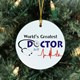 What better way to show your appreciation to your favorite doctor or Medical Student then with this Personalized Worlds Greatest Doctor Ceramic Ornament. Give this Personalized Ornament as a wonderful thank you gift this holiday season or any time of year. Our Worlds Greatest Doctor Ceramic Ornament is a flat Ceramic ornament and measures 2.75" in diameter. Each Ornament includes a ribbon loop to easily hang from your Christmas tree. Includes FREE Personalization! Personalized with any name.