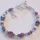 Created in the Fibromyalgia Awareness color of purple, this bracelet is made with Swarovski crystals and bali silver. The Fibromyalgia Bracelet includes a sterling silver awareness charm next to the toggle. Show your support and spread awareness of Fibromyalgia by wearing the bracelet. Each time you wear it, may it remind you that you are not alone.