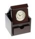 This gorgeous clock will add lasting charm to any room! The lustrous chestnut-colored wood box contains a classic round-face clock; simply flip the lid to reveal the elegant, cleverly-hidden timepiece. This sophisticated clock is embellished with black Roman numerals on a white background. Tuck away small, precious objects for safe-keeping in the clock’s diminutive keepsake drawer. This perfectly-sized 4 3/4” x 4 1/4" x 3 3/4" clock box also makes a great travel item for the busy executive or professional on the go! Add flair to this gift by personalizing it with a name or logo on the box top. 