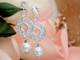 Dont take yourself too seriously when youre wearing these dazzling earrings that combine the elegance of sterling silver with a fun deco-inspired bead.
