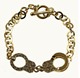 Handcuff Link - This handcuff bracelet has some seriously fabulous hardware. The gold plated handcuffs are on a chain so that it wraps around your wrist. 