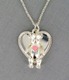 Celebrate a special occasion such as a birthday, First Communion or holiday event with our engravable heart bear necklace. Sterling silver, "moveable" bear with pink epoxy heart. 13 - 2" small open link with spring ring closure.
