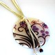 Celebrate a special occasion or celebration or add to your own wardrobe, our Purple Swirl necklace is a great necklace.