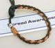 Support a special cause with our Leather Awareness Bracelet. Leather style bracelet with a sterling silver awareness charm.