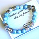 Celebrate the graduation of a new teacher or the end of a school year. Our blue toned and silver inspirational gift bracelet made with glass and silver toned beads is a thoughtful gift idea for someone special.