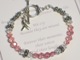 The We Remember bracelet serves as a small reminder to someone who has left a special mark in our hearts. Choose the standard bracelet done in all crystals or an awareness color. Each bracelet comes with an awareness charm or heart charm as well as a recognition crystal for the birthmonth of the person you hold dear.