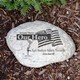 Honor a loved one with our Military Garden Stone. Made of durable resin and has a real stone look. Lightweight, waterproof, measuring 11” W x 8” H x 1 ” D. This Garden Accent Stones is designed for indoor or outdoor use. Engraved with In Loving Memory - Our Hero - Some Gave All 