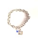Celebrate a special 13th birthday with our silver toned adjustable style gift bracelet. A fun and trendy way to celebrate a 13th birthday. A swarovski bead hangs to signify the birth month. Sterling Silver 13 charm.