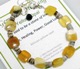 African yellow opal with shell beads with an adjustable sterling silver lobster clasp. Opal is said to be the stone of love with healing power and good luck.