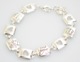 Express your love and let her know in any language you love her. This silver like bracelet expresses love in many ways.