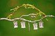 Our Wish Wishbranch is made of lead free pewter and will glow in candlelight and sparkle in the reflection of a mirror. Now our wishbranches are made with removable lettering, so if you want, you can just insert your own word or photos in the frames provided. Note...this wishbranch now comes with a bird wishcharm.