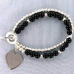 Wisdom Bracelet - Engraved Black Agate and Silvertone Bead Wisdom Bracelet makes a thoughtful and keepsake gift for someone special. Genuine black agate and silvertone 2-strand bracelet with 1” engraveable heart plaque. Free engraving with script up to seven characters. 7 ¾ inches in length with toggle closure.